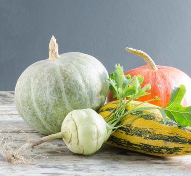 Fresh vegetables on old wooden table. From the series "Autumn vegetables"