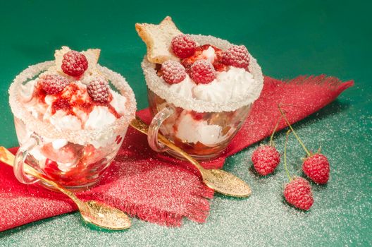 Christmas dessert in a glass with decoration. From series "Cranberry-raspberry trifle"