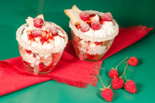 Christmas dessert in a glass with decoration. From series "Cranberry-raspberry trifle"