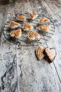 Cookies in the shape of heart on the table. Retro style. From the series "Valentine's Day Cookies"