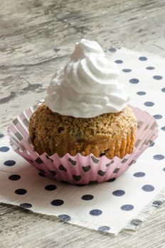 Pumpkin muffins on the table. From the series "Pumpkin Cupcakes"