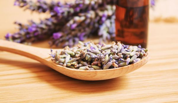 Lavender essential oil in a small bottle. Selective focus. nature.