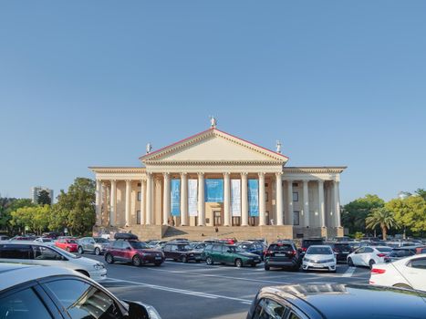 SOCHI, RUSSIA - May 27, 2021. Cars parked in front of Winter Theater or Zimniy Theatre at sunny day.