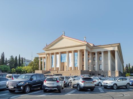 SOCHI, RUSSIA - May 27, 2021. Cars parked in front of Winter Theater or Zimniy Theatre at sunny day.