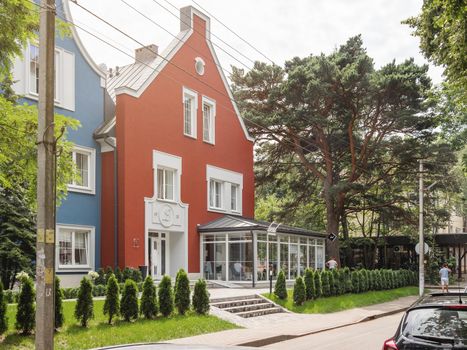 SVETLOGORSK, RUSSIA - July 21, 2019. Colorful buildings of boutique-hotel spa Madame L in European style of modern architecture.