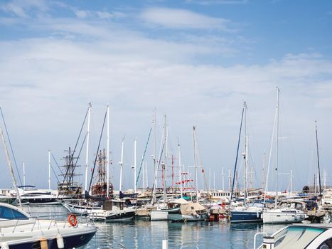 Yachts are moored at the Grand Marina, Kemer, Turkey. Beautiful ships for tourist trips on the Mediterranean sea.