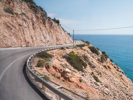 Mountain serpentine road along Mediterranean sea. Demre Finike Yolu road . Turkey.