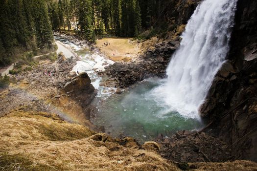 Beautiful landscape showing Krimmler waterfall and some people in Austria