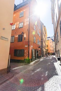 STOCKHOLM, SWEDEN - July 06, 2017. Narrow streets in historic part of town. Old fashioned buildings in Gamla stan.