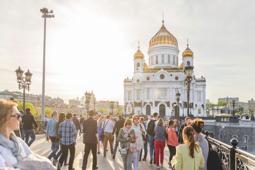 MOSCOW, RUSSIA - May 9, 2015. Cathedral of Christ the Savior and Patriarshy bridge at sunset. Victory Day, day of capitulation of Nazi Germany to Soviet Union in Second World War.