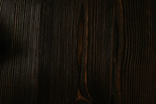 Dark wood texture background. painted Wide board. view from above
