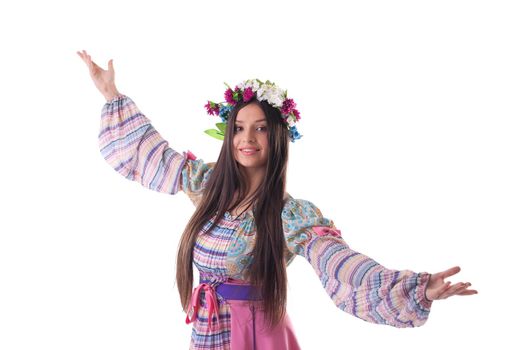 Beauty young girl with garland in traditional russian costume