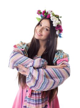 Beauty young girl with garland in traditional russian costume