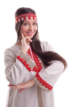 Young girl in dance pose - flax traditional russian costume