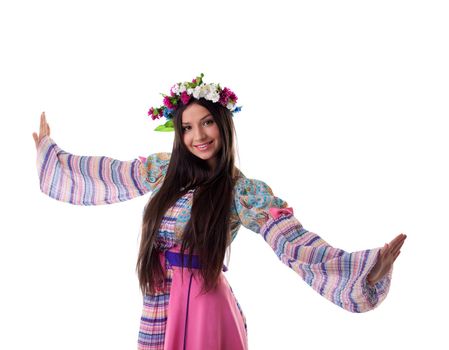 Beauty young girl with garland in traditional russian costume