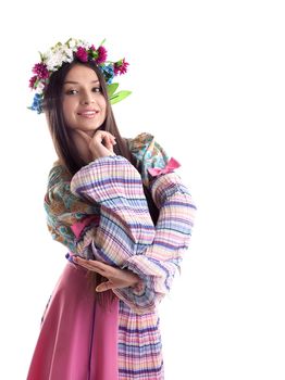 Beauty girl with garland posing in russian costume isolated