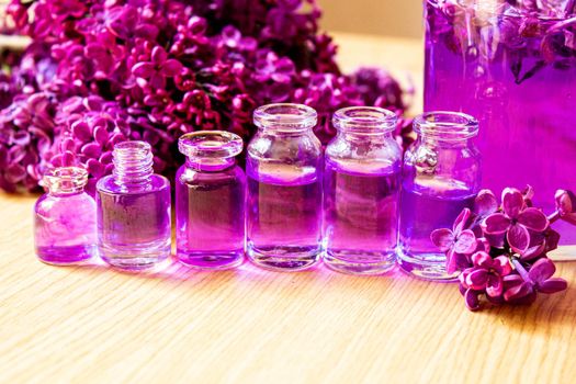 lilac oil in small bottles. selective focus.nat