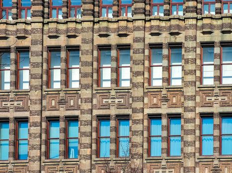 urban texture of a Dutch housing building with glass windows