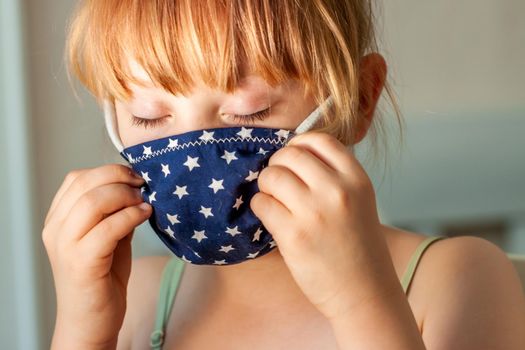 Close up of girl wearing a mask during the pandemic.