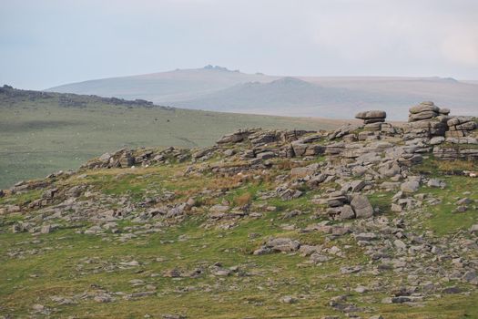 Looking from Great Staple Tor over Roos Tor to north Dartmoor and the highest point of High Willhays, Dartmoor National Park, Devon, UK
