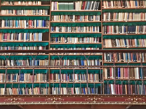 ancient Italian bookshop with books seen frontally and stacked