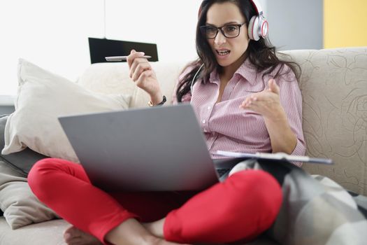 Portrait of woman get angry, burning deadline, busy with work on laptop from home. Fail exam, student, bad mark. Freelancer, remote job, education concept