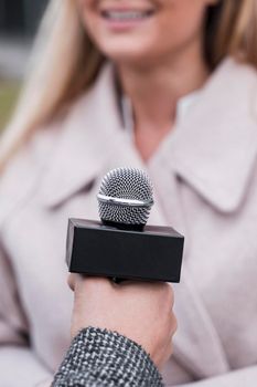 close up journalist microphone