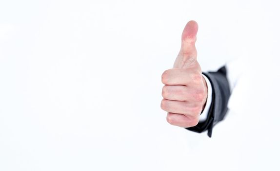 businessman's hand with a thumb gesture up .photo with copy space