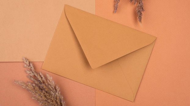 flat lay monochromatic dried lavender envelope