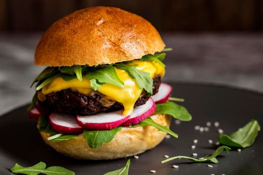 close up cheeseburger board