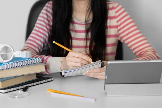 close up woman taking notes