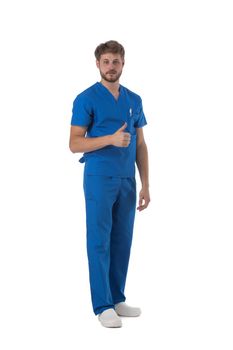 Male nurse or doctor in blue uniform with thumb up studio full length portrait isolated on white background