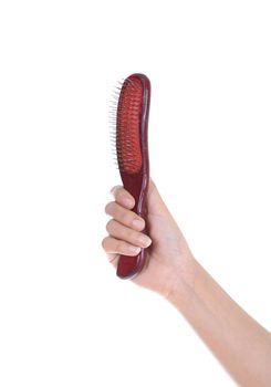 hand with Hairbrush isolated on white background