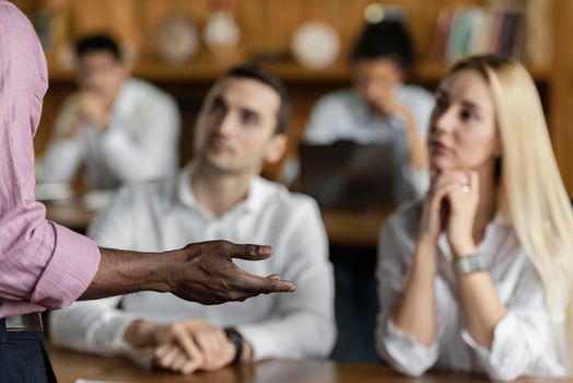 people listening watching man holding presentation work