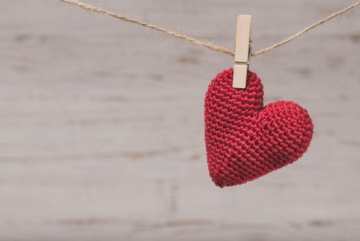 red teddy heart hanging rope