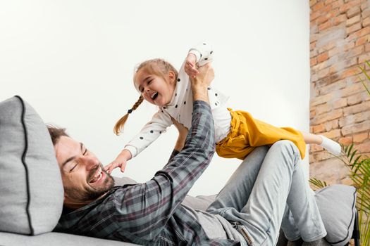 father kid having fun having fun