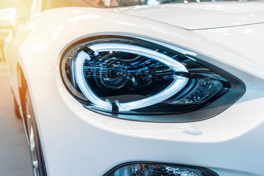 Close up of a red sport luxury car in a showroom