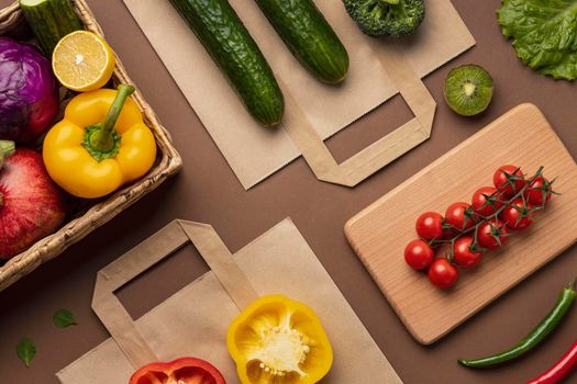 flat lay basket organic vegetables with grocery bag