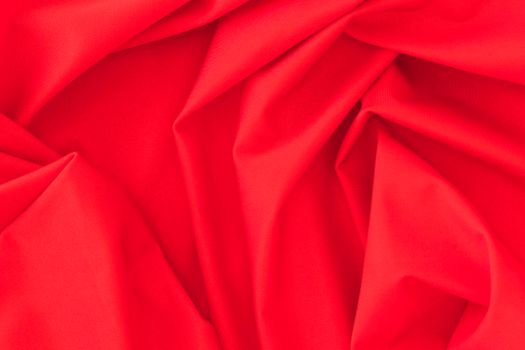 folded red textile fabric texture background