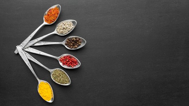 copy space spoons with powder condiments