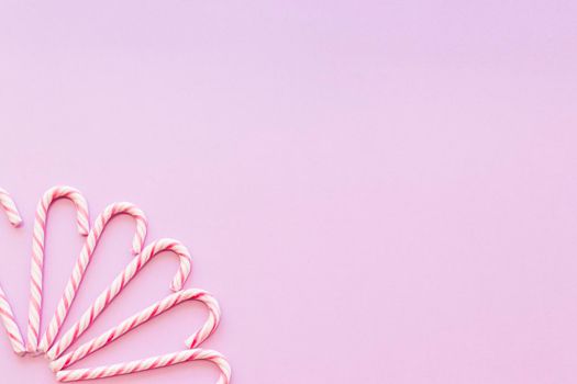 design made with xmas candy cane pink background corner