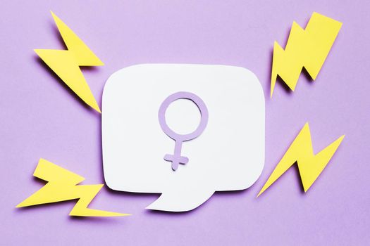 feminine gender sign speech bubble surrounded by thunders