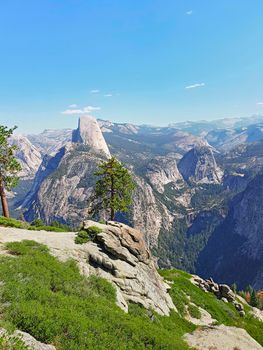 Mariposa, natural landscape with snow-capped mountains and trees, travel reportage in United States