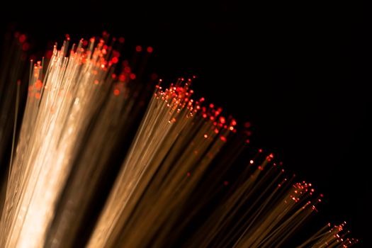 close up optical fiber with red spots