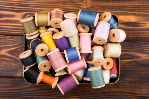 box colorful thread spools