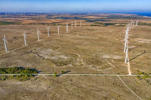 Aerial view at wind turbine farm. Horizontal view