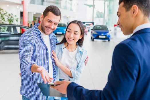 car dealer talking clients