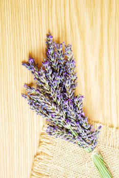 Lavender essential oil in a small bottle. Selective focus.