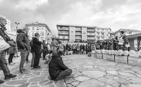 Sanremo, Italy, 20/11/2021: Italian citizens united to demonstrate in the streets against the Green Pass law, journalistic reportage