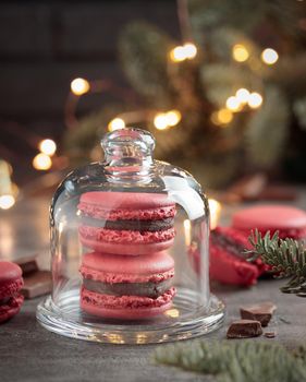 Sweet dessert - red christmas macaroons on a gray background